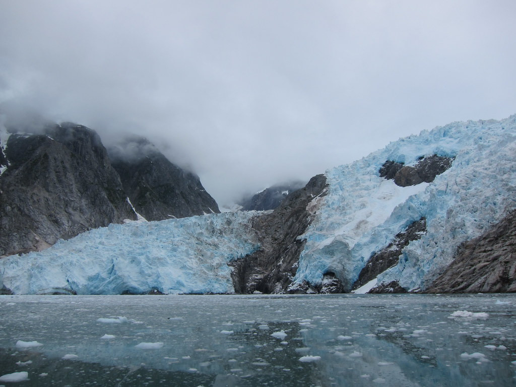 Calving and eerily blue glaciers are another feature as are…